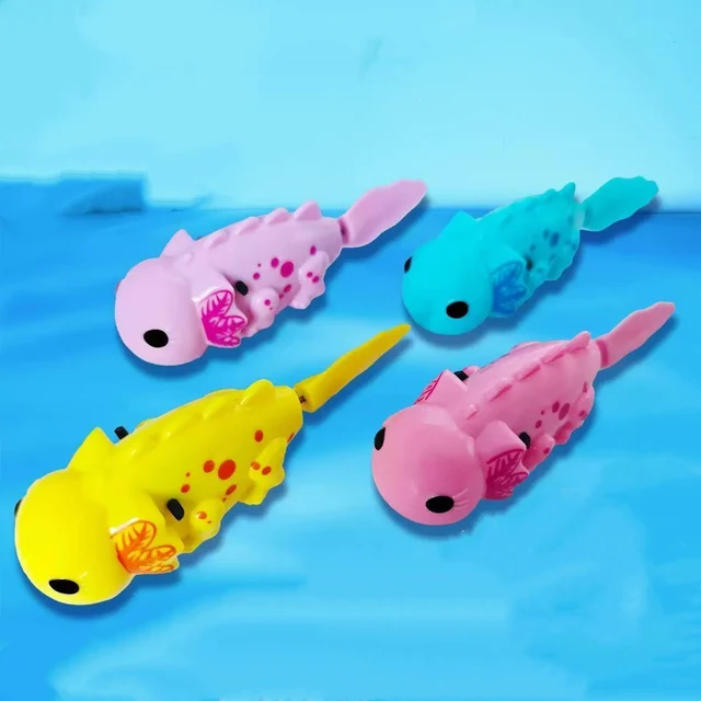 Four colourful battery-operated toy fish